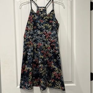 Banana Republic size 8 dress. Floral pattern on dark navy blue. V-neck. Zip side
